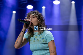 2023-07-29 - Madame, pseudonym of Francesca Calearo sing on stage during her live performs at Villafranca Summer Festival on July 29, 2023 in Villafranca di Verona, Italy. - MADAME - LIVE 2023 - CONCERTS - ITALIAN SINGER AND ARTIST