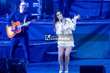 2023-09-27 - Levante, pseudonym of Claudia Lagona sing on stage during her live performs at Arena di Verona for her special date of Opera Futura Tour on September 27, 2023 in Verona, Italy. - LEVANTE - OPERA FUTURA - CONCERTS - ITALIAN SINGER AND ARTIST