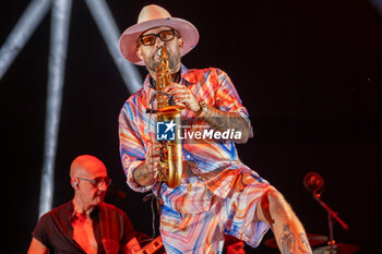 2023-07-23 - The saxophonist Jimmy Sax, stage name of Jeremy Rolland on stage accompanied by Symphonic Dance Orchestra during his live performs at Castello Scaligero in Villafranca for his Summer Tour 2023 on July 23, 2023, Verona Italy. - JIMMY SAX AND SYMPHONIC DANCE ORCHESTRA - SUMMER TOUR 2023 - CONCERTS - SINGER AND ARTIST