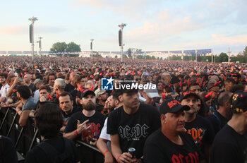 2024-05-25 - Australian heavy metal and rock ’n roll legend band Ac/Dc (guitarist Angus Young and singer Brian Johnson) performing on stage during their “Pwr/up Tour at RCF Arena in Reggio Emilia, Italy, May 25, 2024 - photo Michele Nucci - AC/DC PWR UP TOUR - CONCERTS - MUSIC BAND