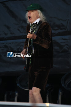 2024-05-25 - Australian heavy metal and rock ’n roll legend band Ac/Dc (guitarist Angus Young and singer Brian Johnson) performing on stage during their “Pwr/up Tour at RCF Arena in Reggio Emilia, Italy, May 25, 2024 - photo Michele Nucci - AC/DC PWR UP TOUR - CONCERTS - MUSIC BAND