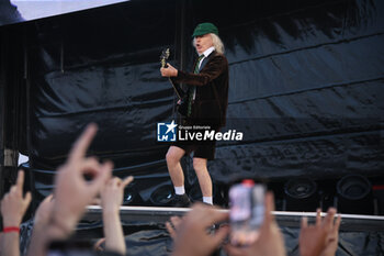 2024-05-25 - Australian heavy metal and rock ’n roll legend band Ac/Dc (guitarist Angus Young and singer Brian Johnson) performing on stage during their “Pwr/up Tour at RCF Arena in Reggio Emilia, Italy, May 25, 2024 - photo Michele Nucci - AC/DC PWR UP TOUR - CONCERTS - MUSIC BAND