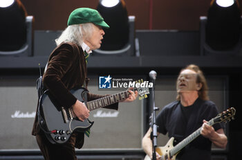 2024-05-25 - Australian heavy metal and rock ’n roll legend band Ac/Dc (guitarist Angus Young and singer Brian Johnson) performing on stage during their “Pwr/up Tour at RCF Arena in Reggio Emilia, Italy, May 25, 2024 - photo Michele Nucci - AC/DC PWR UP TOUR - CONCERTS - MUSIC BAND