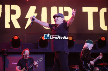 2024-05-25 - Australian heavy metal and rock ’n roll legend band Ac/Dc (guitarist Angus Young and singer Brian Johnson) performing on stage during their “Pwr/up Tour at RCF Arena in Reggio Emilia, Italy, May 25, 2024 - photo Michele Nucci - AC/DC PWR UP TOUR - CONCERTS - MUSIC BAND