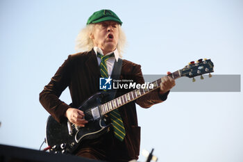 2024-05-25 - Australian heavy metal and rock ’n roll legend band Ac/Dc (guitarist Angus Young and singer Brian Johnson) performing on stage during their “Pwr/up Tour at RCF Arena in Reggio Emilia, Italy, May 25, 2024 - photo Michele Nucci - AC/DC PWR UP TOUR - CONCERTS - MUSIC BAND