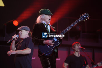 2024-05-25 - Australian heavy metal and rock ’n roll legend band Ac/Dc (guitarist Angus Young and singer Brian Johnson) performing on stage during their “Pwr/up Tour at RCF Arena in Reggio Emilia, Italy, May 25, 2024 - photo Michele Nucci - AC/DC PWR UP TOUR - CONCERTS - MUSIC BAND