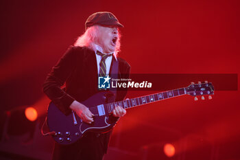 2024-05-25 - Australian heavy metal and rock ’n roll legend band Ac/Dc (guitarist Angus Young and singer Brian Johnson) performing on stage during their “Pwr/up Tour at RCF Arena in Reggio Emilia, Italy, May 25, 2024 - photo Michele Nucci - AC/DC PWR UP TOUR - CONCERTS - MUSIC BAND