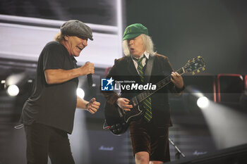 2024-05-25 - Australian heavy metal and rock ’n roll legend band Ac/Dc (guitarist Angus Young and singer Brian Johnson) performing on stage during their “Pwr/up Tour at RCF Arena in Reggio Emilia, Italy, May 25, 2024 - photo Michele Nucci - AC/DC PWR UP TOUR - CONCERTS - MUSIC BAND