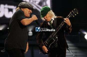 2024-05-25 - Australian heavy metal and rock ’n roll legend band Ac/Dc (guitarist Angus Young and singer Brian Johnson) performing on stage during their “Pwr/up Tour at RCF Arena in Reggio Emilia, Italy, May 25, 2024 - photo Michele Nucci - AC/DC PWR UP TOUR - CONCERTS - MUSIC BAND