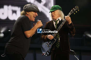 2024-05-25 - Australian heavy metal and rock ’n roll legend band Ac/Dc (guitarist Angus Young and singer Brian Johnson) performing on stage during their “Pwr/up Tour at RCF Arena in Reggio Emilia, Italy, May 25, 2024 - photo Michele Nucci - AC/DC PWR UP TOUR - CONCERTS - MUSIC BAND