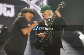 2024-05-25 - Australian heavy metal and rock ’n roll legend band Ac/Dc (guitarist Angus Young and singer Brian Johnson) performing on stage during their “Pwr/up Tour at RCF Arena in Reggio Emilia, Italy, May 25, 2024 - photo Michele Nucci - AC/DC PWR UP TOUR - CONCERTS - MUSIC BAND