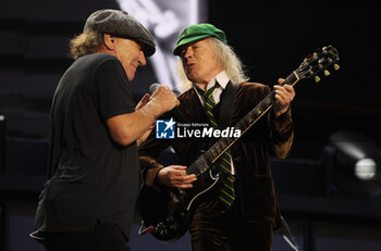 2024-05-25 - Australian heavy metal and rock ’n roll legend band Ac/Dc (guitarist Angus Young and singer Brian Johnson) performing on stage during their “Pwr/up Tour at RCF Arena in Reggio Emilia, Italy, May 25, 2024 - photo Michele Nucci - AC/DC PWR UP TOUR - CONCERTS - MUSIC BAND