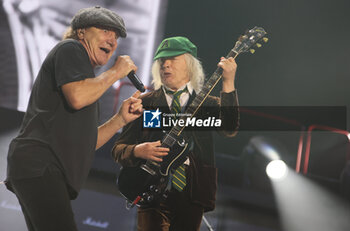 2024-05-25 - Australian heavy metal and rock ’n roll legend band Ac/Dc (guitarist Angus Young and singer Brian Johnson) performing on stage during their “Pwr/up Tour at RCF Arena in Reggio Emilia, Italy, May 25, 2024 - photo Michele Nucci - AC/DC PWR UP TOUR - CONCERTS - MUSIC BAND