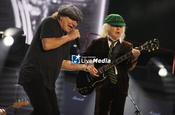 2024-05-25 - Australian heavy metal and rock ’n roll legend band Ac/Dc (guitarist Angus Young and singer Brian Johnson) performing on stage during their “Pwr/up Tour at RCF Arena in Reggio Emilia, Italy, May 25, 2024 - photo Michele Nucci - AC/DC PWR UP TOUR - CONCERTS - MUSIC BAND