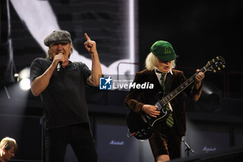 2024-05-25 - Australian heavy metal and rock ’n roll legend band Ac/Dc (guitarist Angus Young and singer Brian Johnson) performing on stage during their “Pwr/up Tour at RCF Arena in Reggio Emilia, Italy, May 25, 2024 - photo Michele Nucci - AC/DC PWR UP TOUR - CONCERTS - MUSIC BAND