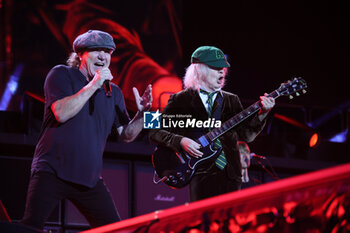 2024-05-25 - Australian heavy metal and rock ’n roll legend band Ac/Dc (guitarist Angus Young and singer Brian Johnson) performing on stage during their “Pwr/up Tour at RCF Arena in Reggio Emilia, Italy, May 25, 2024 - photo Michele Nucci - AC/DC PWR UP TOUR - CONCERTS - MUSIC BAND