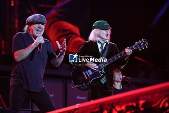 2024-05-25 - Australian heavy metal and rock ’n roll legend band Ac/Dc (guitarist Angus Young and singer Brian Johnson) performing on stage during their “Pwr/up Tour at RCF Arena in Reggio Emilia, Italy, May 25, 2024 - photo Michele Nucci - AC/DC PWR UP TOUR - CONCERTS - MUSIC BAND