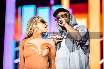 16/07/2024 - Will.i.am (William James Adams) and J. Rey Soul (Jessica Joy Seria Reynoso) of Black Eyed Peas - BLACK EYED PEAS - CONCERTI - BAND STRANIERE