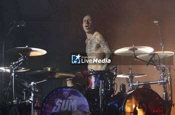 2024-11-16 - Canadian pop-punk band SUM41 during their “Tour Of The Setting Sum” at Unipol Arena, Casalecchio, (Bo), Italy, November 16, 2024 - photo: Michele Nucci - SUM 41 IN 