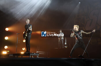 2024-11-16 - Canadian pop-punk band SUM41 during their “Tour Of The Setting Sum” at Unipol Arena, Casalecchio, (Bo), Italy, November 16, 2024 - photo: Michele Nucci - SUM 41 IN 