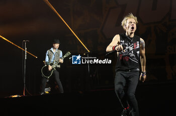 2024-11-16 - Canadian pop-punk band SUM41 during their “Tour Of The Setting Sum” at Unipol Arena, Casalecchio, (Bo), Italy, November 16, 2024 - photo: Michele Nucci - SUM 41 IN 