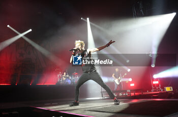 2024-11-16 - Canadian pop-punk band SUM41 during their “Tour Of The Setting Sum” at Unipol Arena, Casalecchio, (Bo), Italy, November 16, 2024 - photo: Michele Nucci - SUM 41 IN 