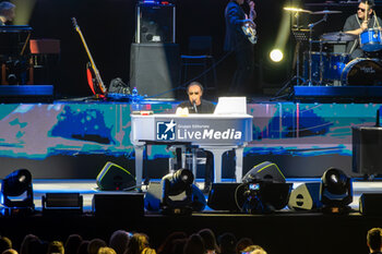 2024-05-19 - Antonello Venditti pseudonym of Antonio Venditti on a stage at Arena di Verona for his first live performs of his new tour “Notte Prima Degli Esami - 1984-2024 40th Anniversary” on May 19, 2024 in Verona, Italy. - ANTONELLO VENDITTI - NOTTE PRIMA DEGLI ESAMI - 1984-2024 40TH ANNIVERSARY - CONCERTS - ITALIAN SINGER AND ARTIST