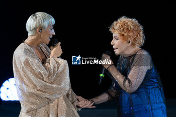 2024-06-06 - Malika Ayane and Ornella Vanoni during the the Ornella Vanoni Senza Fine Tour Concert at Terme di Caracalla in Rome, Italy, on june 06, 2024 - ORNELLA VANONI - SENZA FINE TOUR - CONCERTS - ITALIAN SINGER AND ARTIST