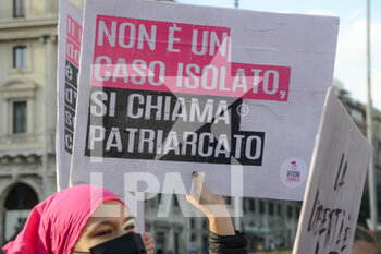 2021-11-27 - Demonstrator with banner - DEMONSTRATION AGAINST VIOLENCE AGAINST WOMEN “NON UNA DI MENO”. - NEWS - SOCIETY