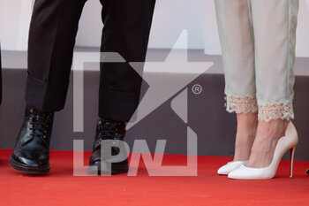 2021-09-03 - Pablo Larrain, Kristen Stewart (shoes detail) attend the red carpet of the movie 