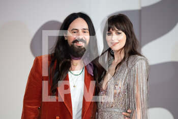 2021-09-03 - Alessandro Michele and Dakota Johnson attend the red carpet of the movie 