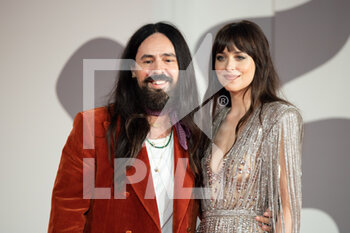 2021-09-03 - Alessandro Michele and Dakota Johnson attend the red carpet of the movie 