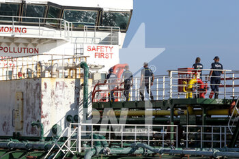 2022-08-16 - Port authority members of Monopoli (Italy), board on the Ukrainian ship Mustafa Necati for checks. The ship, left from Odessa harbour, contains 6000 tons of sunflower oil - UCRANIAN SHIP WITH SUNFLOWER OIL ARRIVES IN ITALY - NEWS - CHRONICLE