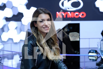 2022-11-08 - Model at Kymco Motorcycle stand - EICMA - 2022 INTERNATIONAL CYCLE AND MOTORCYCLE EXPOSITION - NEWS - EVENTS