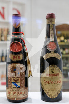 2022-04-10 - Olds Amarone wines bottles exposed in 2022 edition of Vinitaly fair in Verona - 54TH EDITION OF VINITALY - INTERNATIONAL FAIR OF WINES IN VERONA - NEWS - EVENTS