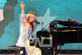 2022-07-02 - Photo LiveMedia/Carmelo Imbesi. Taormina Messina, Italy, July 2, 2022, 68th Taormina Film Fest.
In the pic: Noemi performs on Teatro Antico stage during the Taormina Film Fest 2022. - 68TH TAORMINA FILM FEST 2022 - NEWS - EVENTS