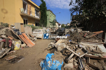 2023-05-22 - City of Faenza damage after flood - volunteers, street cleaning, debris and rubble in the streets. - in the pic. Municipal music school damages - Faenza, (RA), May 22, 2023 - photo: stringer Bologna - FLOOD DAMAGES IN THE CITY OF FAENZA - REPORTAGE - ENVIRONMENT