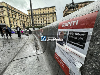 2023-11-03 - Leaflets on Hamas hostages in Naples, Campania, Italy - 03 November 2023 Leaflets with pictures and information on the people kidnapped by Hamas in Israel on 7 October 2023 posted in the city centre. - HAMAS HOSTAGE FLYERS IN NAPLES - NEWS - CHRONICLE