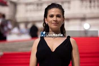 2023-06-19 - Hayley Atwell (in a Givenchy dress and Bulgari jewels), attends the Red Carpet at the Global Premiere of Paramount Pictures' 