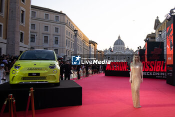 2023-06-19 - Vanessa Kirby (in a Miu Miu dress near a Fiat 500 Abarth) attends the Global Premiere of Paramount Pictures' 