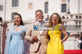2023-06-19 - Director Christopher McQuarrie, wife Heather and daughter Wilhelmina, attend the Red Carpet at the Global Premiere of Paramount Pictures' 