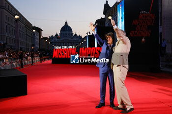 2023-06-19 - Tom Cruise and Chris McQuarrie attend the Global Premiere of Paramount Pictures' 