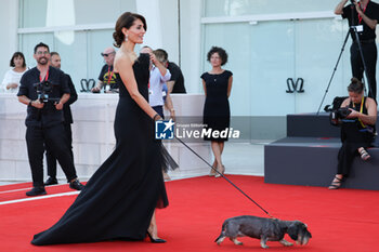 2023-09-01 - Caterina Murino and her dog, attend a red carpet for the movie 