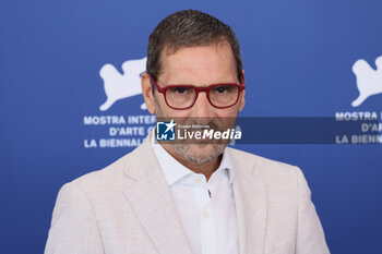 2023-09-05 - Adamo Dionisi attends a photocall for 