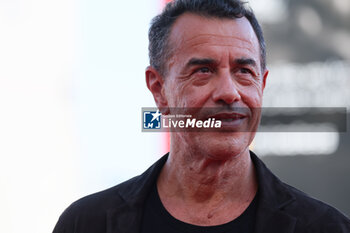 2023-09-06 - Director Matteo Garrone attends a red carpet for the movie 