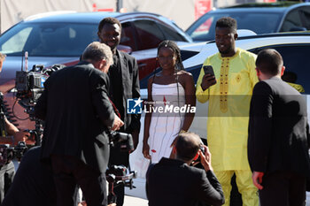 2023-09-06 - Mamadou Kouassi, Flaure B.B. Kabore and a guest attend a red carpet for the movie 
