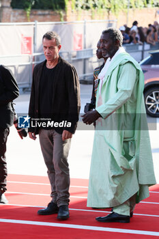 2023-09-06 - Matteo Garrone and Issaka Sawagodo attend a red carpet for the movie 