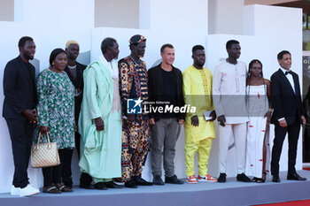 2023-09-06 - Mamadou Kouassi, guest, Moustapha Fall, Issaka Sawagodo, guest, Matteo Garrone, guest, Seydou Sarr, Flaure B.B. Kabore and Hichem Yacoubi attend a red carpet for the movie 