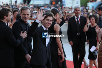 2023-09-07 - (L-R) Franz Rogowski, Christophe Sermet and Filippo Giulini attend a red carpet for the movie 
