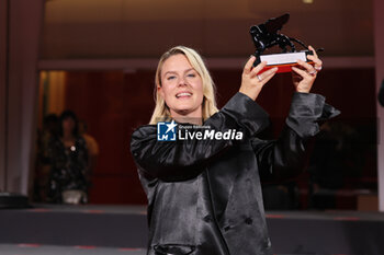 2023-09-09 - Mika Gustafson poses with the Best Director Award for film 'Paradise Is Burning' at the winner's photocall at the 80th Venice International Film Festival on September 09, 2023 in Venice, Italy. ©Photo: Cinzia Camela. - WINNERS PHOTOCALL - THE 80TH VENICE INTERNATIONAL FILM FESTIVAL - NEWS - VIP